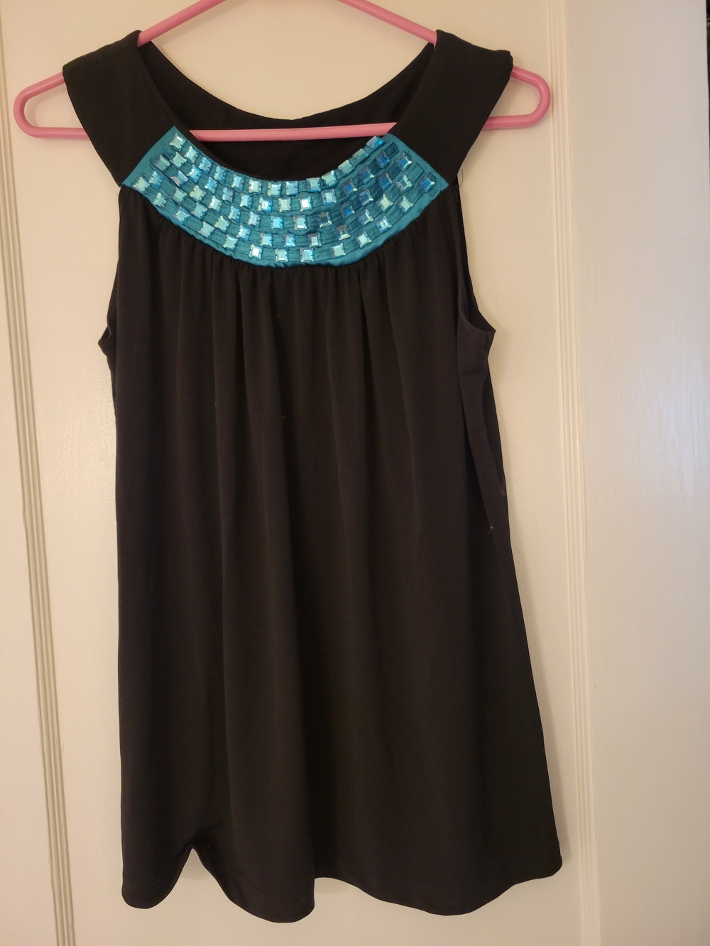 Simply Irresistible Black Top with Teal Accents
